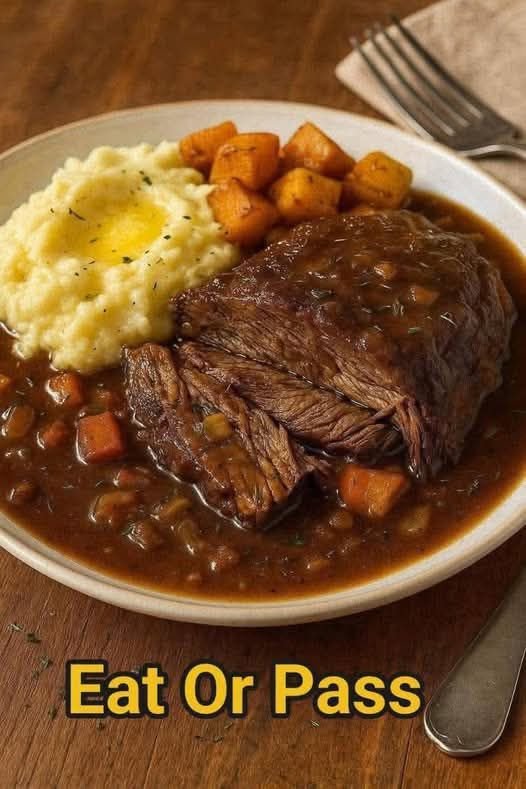Slow-Cooked Pot Roast with Gravy Over Creamy Mashed Potatoes