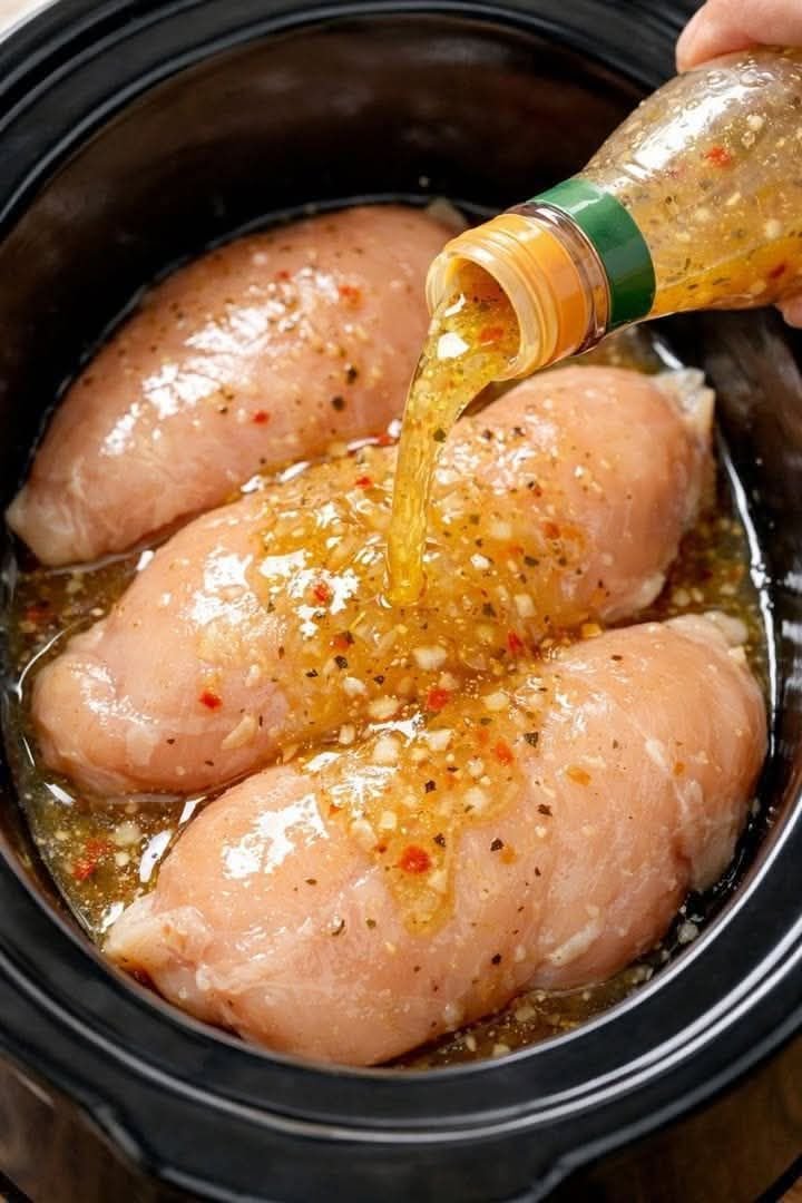 Pour this store-bought Italian dressing and just 2 more ingredients over chicken breasts in the slow cooker for an easy classic that works any night 